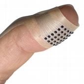 Bandage-like device brings texture to touchscreens